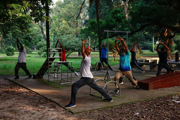 People exercise at Ramna Park in the morning, in Dhaka