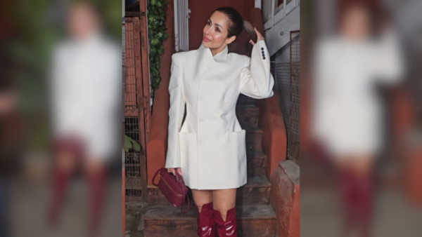 Malaika Arora in white blazer and red boots