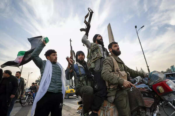 One week into a new Syria, rebels aim for normalcy and Syrians vow not to be silent again. (AP)
