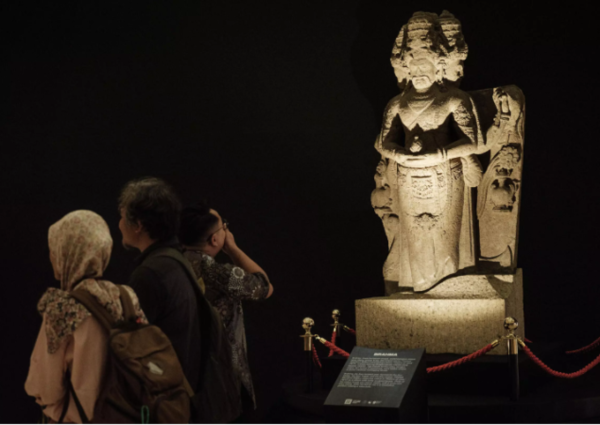 A recently repatriated statue of Brahma, the four-headed deity, is displayed during the reopening ceremony at Indonesia's National Museum (Credit: AFP)