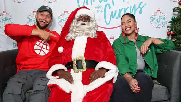 Stephen and Ayesha Curry at Madison Park Academy for Christmas with the Currys