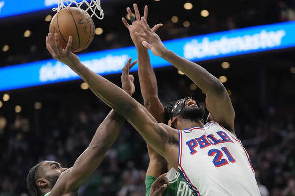 76ers star Joel Embiid falls during warmups but remains in lineup for matchup with Celtics