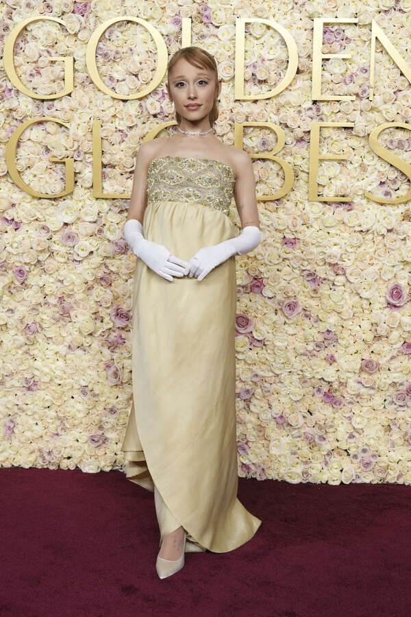 Golden Globes Fashion: Ariana Grande eschews Glinda pink for pale yellow (brick road) silk