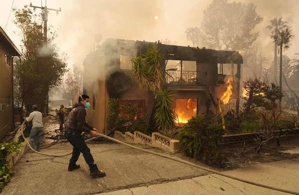 Photos capture how wildfires are ravaging through Southern California 3 days after igniting