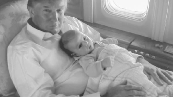 Donald Trump holding baby Barron Trump