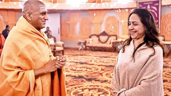 Politician and Dream Girl Hema Malini with spiritual guru Awadheshanand at the Maha Kumbh recently