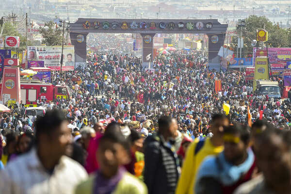 Prayagraj: Devotees arrive to take a holy dip during the ongoing Mahakumbh Mela,...