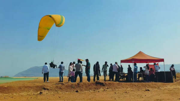 Student paraglides to examination hall