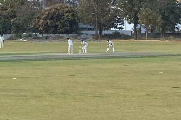 Rahul Dravid fielding in the slip cordon with his younger son Anvay Dravid keeping wickets in Bengaluru on Saturday