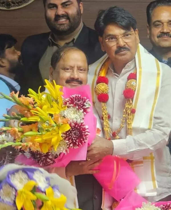 Senior advocate and Rajya Sabha member Manan Kumar Mishra, who himself has been elected for a record seventh term as Bar Council of India chairman, greeting the vice-chairman Prabakaran in New Delhi on Sunday.