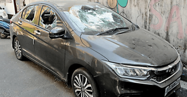A car ransacked by locals after the incident