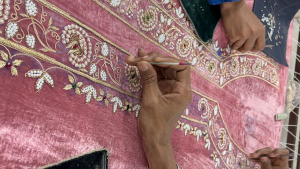 Zardozi also involves embroidery of raised metal wires (dabka) on the fabric and looks best on raw silk, organza, crepe and velvet fabrics (Pic: @shikaarbaghofficial)