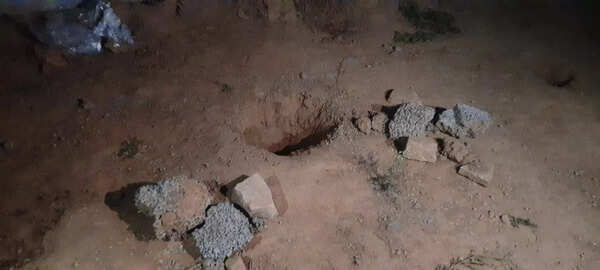 4-year-old boy burying body at construction site