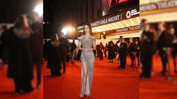 Lily Collins in champagne-gold dress
