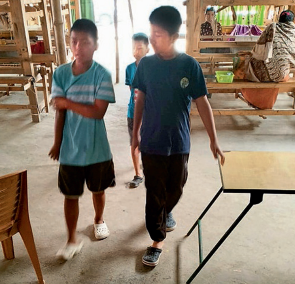 Children navigate life inside a Manipur relief camp, adapting to their new reality amidst the turmoil