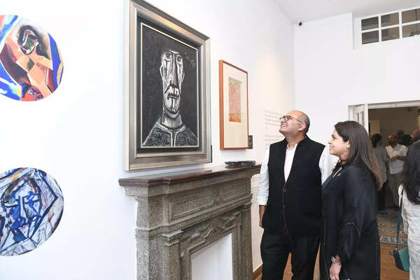 Uday Jain, Director of Dhoomimal Gallery, with Sunaina Jain at F.N. Souza A Continuum