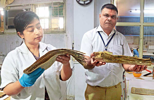 A team restores manuscripts in the lab