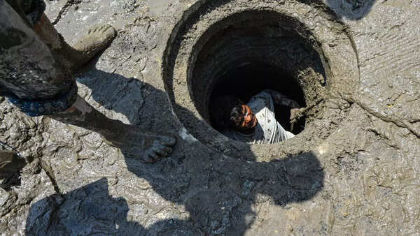 sewage workers