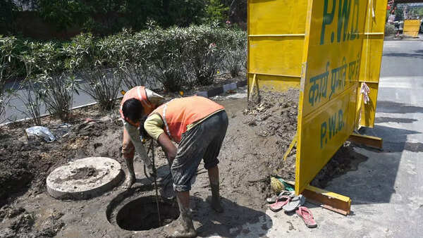 sewage workers