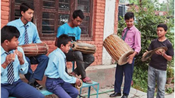 Nepali students playing music