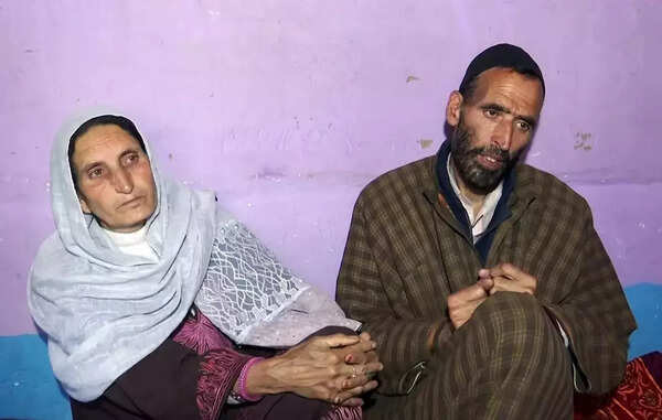 Family members of Syed Adil Hussain Shah