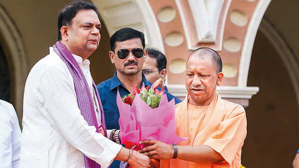 Yatindra Mishra with UP CM Yogi Adityanath