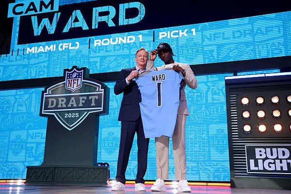 Quarterback Cam Ward of Miami celebrates after being selected first overall pick by the Tennessee Titans during the first round of the 2025 NFL Draft