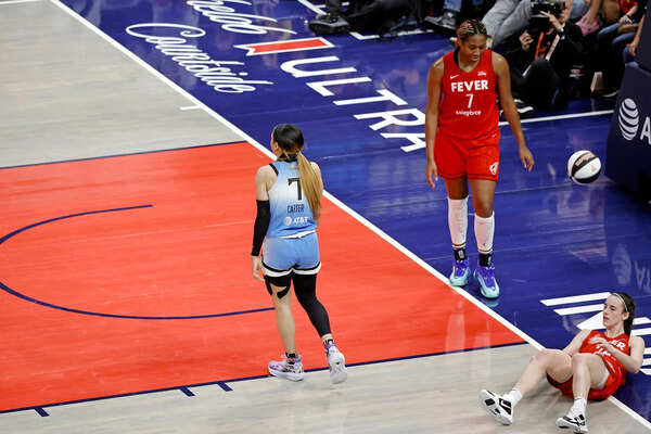 Chicago Sky’s Carter shoulder checked Indiana Fever’s Clark during a game on Saturday, knocking her to the ground: Sportswire Chennedy Carter’s foul on Caitlin Clark