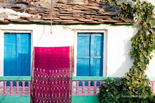 Chanderi_Silk_Sari_outside_a_village_home_in_Pranpur._(7045778685)