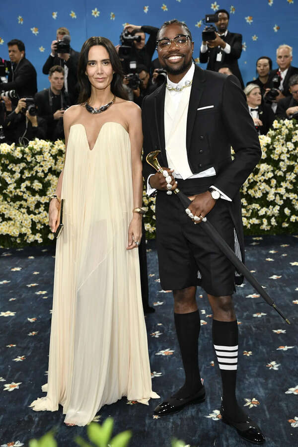 Ana Khouri, left, and Noah Lyles attend The Metropolitan Museum of Art's Costume Institute benefit gala celebrating the opening of the "Superfine: Tailoring Black Style" exhibition on Monday, May 5, 2025, in New York. (AP) 2025 MET Museum Costume Institute Benefit Gala