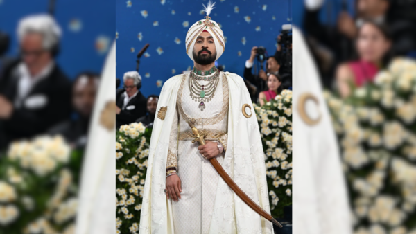 Channelling his cultural roots through style and breaking Western fashion stereotypes, Diljit’s couture screamed of dramatic silhouette, rich colour, and iconic detailing. In true showman style, the singer-actor stepped out of New York’s Carlyle Hotel in an impeccably tailored white sherwani suit with a structured mid-slit and layered it with a traditional Indian cape, exuding royal finesse.(Image Credits: Instagram) Diljit Dosanjh is ready for the Met Gala