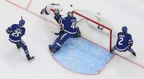 Anthony Stolarz #41 of the Toronto Maple Leafs makes a save against Sam Bennett #9 of the Florida Panthers