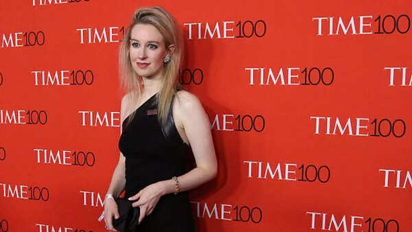 What is Elizabeth Holmes' net assets?