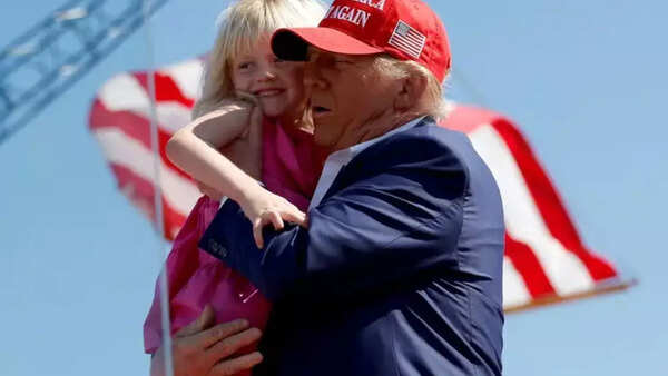 Carolina Dorothy Trump with grandfather Donald Trump