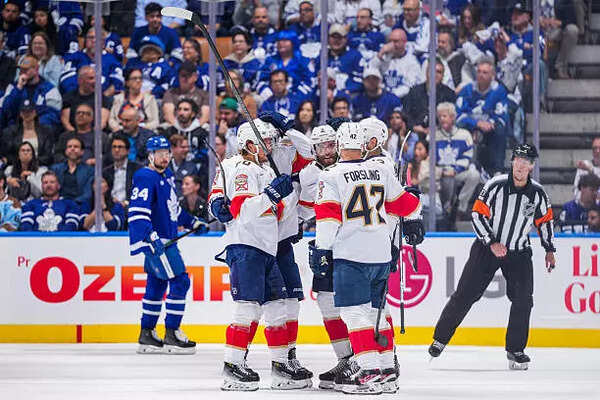 The Florida Panthers celebrates with teammates scoring against the Toronto Maple Leafs