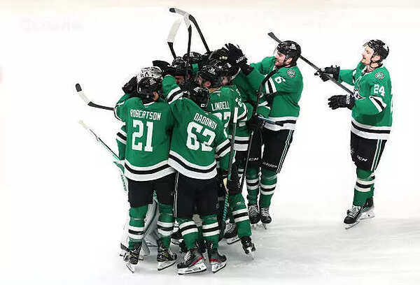 The Dallas Stars celebrate after defeating the Winnipeg Jets in overtime to win Game Six