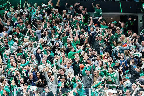 The fans celebrate a goal during game one