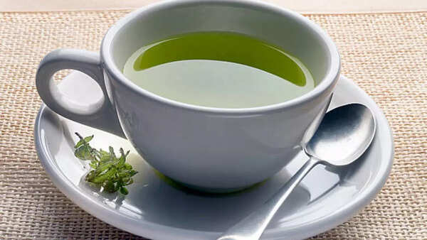 Image credits: Getty Images Two cups of green tea