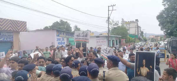 Activists protesting outside the Kotdwar court