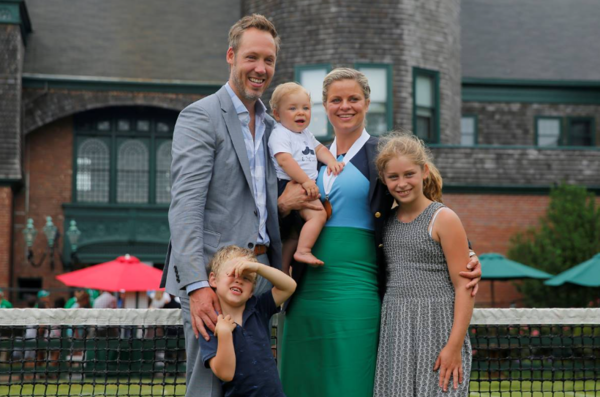 Grand Slam stars Kim Clijsters and Lleyton Hewitt with their children (Image via Tennis World USA)