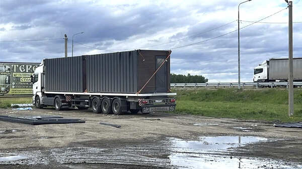 This photo released by Governor of Irkutsk region Igor Kobzev telegram channel on Sunday, June 1, 2025, shows a truck used to release some of the Ukrainian drones that attacked Russian air bases in the Irkutsk region, more than 4,000 kilometers (2,500 miles) from Ukraine. (Governor of Irkutsk region Igor Kobzev telegram channel via AP) Russia Ukraine