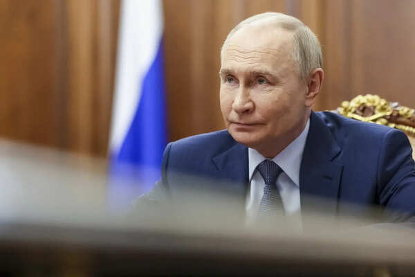 Russian President Vladimir Putin speaks with the Presidential Commissioner for Children's Rights Maria Lvova-Belova during their meeting at the Kremlin, in Moscow, Russia, Monday, June 2, 2025. (Gavriil Grigorov, Sputnik, Kremlin Pool Photo via AP) Vladimir Putin