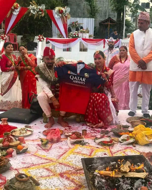 Pumdicot, fans praying for RCB's victory at their wedding in Nepal. Pumdicot, fans praying for RCB's victory at their wedding in Nepal.