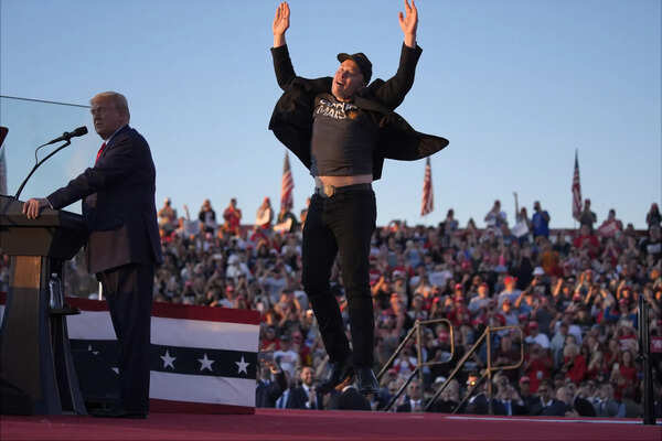 File - Elon Musk jumps on stage as Republican presidential candidate former President Donald Trump Butler speaks at a campaign rally at Butler, Pa (AP Photo/Ivan Wuki, File) on 5 October 2024. AP Photos: Opening Trump and Elon Musk's relationship