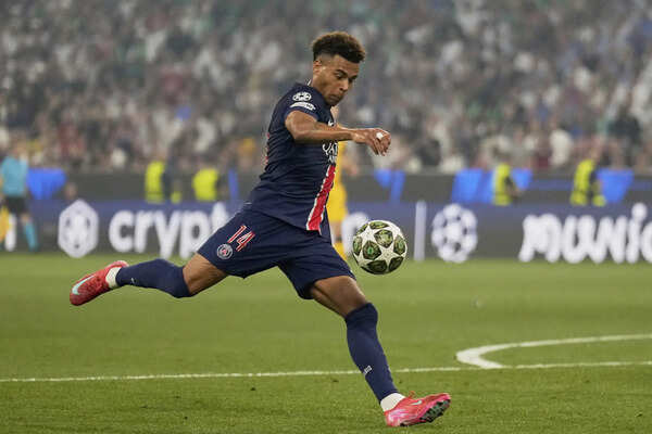 PSG's Desire Doue scores his side's second goal during the Champions League final match between Paris Saint-Germain and Inter Milan at the Allianz Arena in Munich. (AP) AP PHOTOS: PSG leads 2-0 against Inter Milan at halftime in the Champions League final