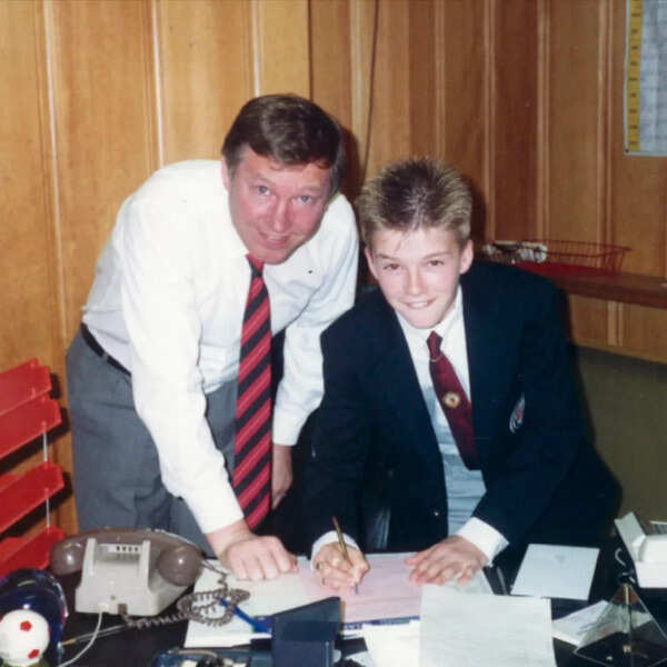 A young David Beckham with Sir Alex Ferguson