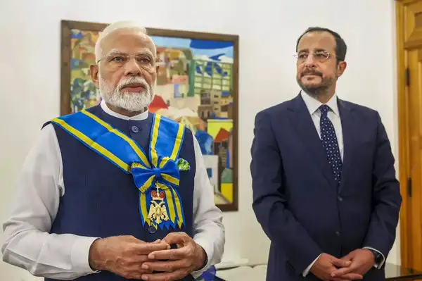 Prime Minister Narendra Modi with the Grand Cross of Makaros III's order. PM Modi in Cyprus.