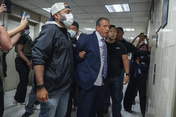 New York City Comptroller Brad Lander is placed under arrest by Immigration and Customs Enforcement (ICE) and FBI agents outside federal immigration court on Tuesday, June 17, 2025, in New York. (AP Photo/Olga Fedorova) NYC mayoral candidate is arrested at immigration court after linking arms with man being detained