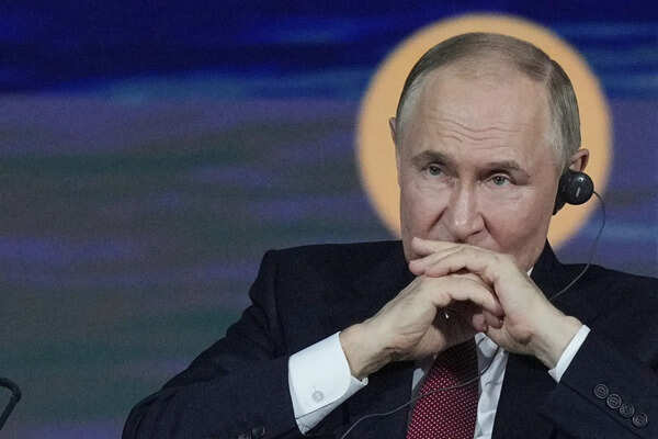 Russian President Vladimir Putin attends a plenary session of the St. Petersburg International Economic Forum in St. Petersburg, Russia, on Friday, June 20, 2025. (AP Photo/Dmitri Lovetsky) Vladimir Putin