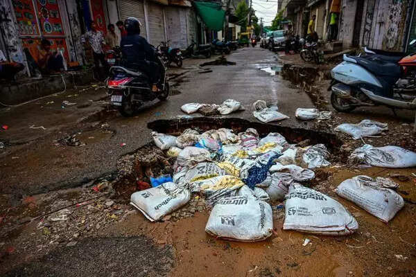 Built To Break: Week-long rain rips apart city’s fragile roads, sparks civic outrage.